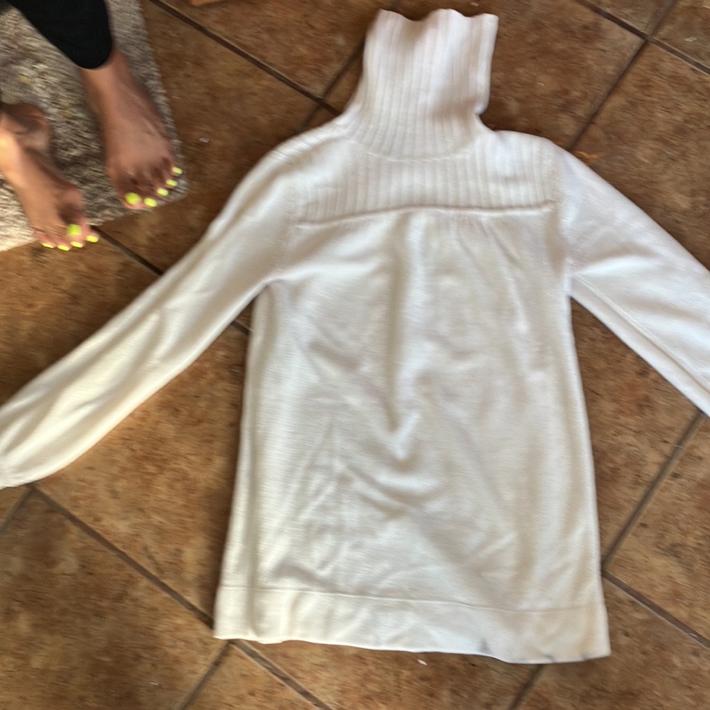 White turtle neck sweater never used.